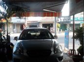 Xe Kia Carens EX MT sản xuất năm 2010, màu bạc 