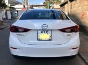 Cần bán xe Mazda 3 sản xuất 2015, màu trắng chính chủ, 570 triệu