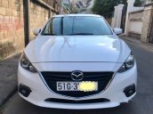 Cần bán xe Mazda 3 sản xuất 2015, màu trắng chính chủ, 570 triệu