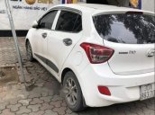 Cần bán gấp Hyundai Grand i10 AT 1.0 2014, màu trắng, xe đẹp