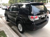 Bán Toyota Fortuner 2.5G đời 2014, màu đen số sàn