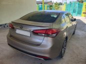 Bán xe Kia Cerato 2.0 AT bản full, màu vàng cát, sang trọng