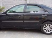 Cần bán Toyota Camry 3.0V đời 2003, màu đen, 310 triệu