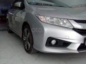 Cần bán lại xe Honda City năm 2016, màu bạc xe gia đình