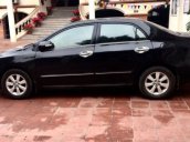 Chính chủ bán Toyota Corolla Altis 1.8 AT đời 2011, màu đen, giá 580tr