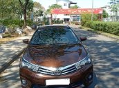 Bán xe Toyota Corolla Altis sản xuất 2015, màu nâu, xe nhà cần tiền bán gấp 630 triệu