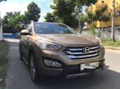 Cần bán xe Hyundai Santa Fe màu nâu đồng, máy 2.4 số tự động, 4WD, Sx 2014, lắp ráp tại Việt Nam