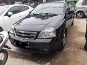 Cần bán lại xe Chevrolet Lacetti đời 2011, màu đen còn mới