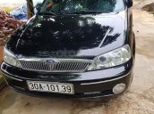 Bán Ford Laser 1.8 sản xuất năm 2003, màu đen, gầm bệ chắc chắn, điều hòa lạnh sâu