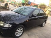 Cần bán lại xe Mazda 323 đời 1997, màu đen như mới