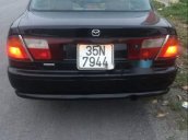 Cần bán lại xe Mazda 323 đời 1997, màu đen như mới