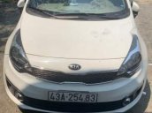 Cần bán gấp Kia Rio đời 2017, màu trắng, xe còn 98%