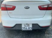 Cần bán gấp Kia Rio đời 2017, màu trắng, xe còn 98%