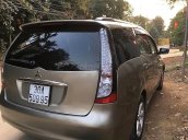 Gia đình cần bán Mitsubishi Grandis 2.4 AT sản xuất năm 2008, màu vàng