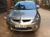 Gia đình cần bán Mitsubishi Grandis 2.4 AT sản xuất năm 2008, màu vàng