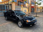 Bán xe Daewoo Magnus sản xuất năm 2005, màu đen xe gia đình