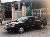 Bán xe Daewoo Magnus sản xuất năm 2005, màu đen xe gia đình