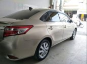 Bán Toyota Vios G 2015, màu vàng xe gia đình