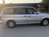 Bán xe Kia Carnival 7 chỗ 2006, số tay, máy xăng, màu bạc