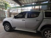 Cần bán xe Mitsubishi Triton 2009 máy dầu, 4x2 MT, màu bạc, odo 96.000Km, biển số TP