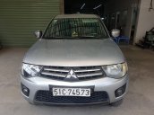 Cần bán xe Mitsubishi Triton 2009 máy dầu, 4x2 MT, màu bạc, odo 96.000Km, biển số TP