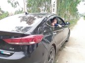 Gia đình bán xe Hyundai Elantra 1.6 MT đời 2017, màu đen số sàn