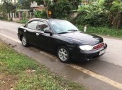 Bán Kia Spectra sản xuất năm 2004, màu đen xe gia đình