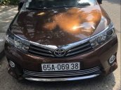 Bán ô tô Toyota Corolla altis 2.0V AT đời 2015, màu nâu xe gia đình