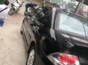 Bán Mitsubishi Lancer đời 2004, màu đen, máy móc còn nguyên zin