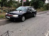 Bán Kia Spectra sản xuất năm 2004, màu đen xe gia đình