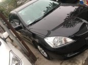 Bán Mitsubishi Lancer đời 2004, màu đen, máy móc còn nguyên zin