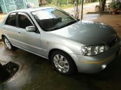 Bán Ford Laser GHIA 1.8 AT đời 2004, màu bạc, xe đẹp 