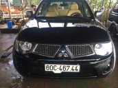 Cần bán xe Mitsubishi Triton đời 2011, màu đen