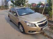 Cần bán xe Chevrolet Cruze MT đời 2014, màu vàng, nhập khẩu, đã đi 60.000km