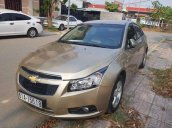 Cần bán xe Chevrolet Cruze MT đời 2014, màu vàng, nhập khẩu, đã đi 60.000km