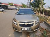 Cần bán xe Chevrolet Cruze MT đời 2014, màu vàng, nhập khẩu, đã đi 60.000km