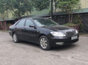 Bán Toyota Vios đời 2004, màu đen  