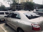 Cần bán xe Toyota Vios E đời 2013, màu vàng