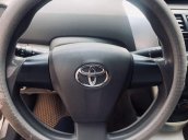 Cần bán xe Toyota Vios E đời 2013, màu vàng