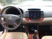 Bán Toyota Vios đời 2004, màu đen  