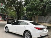 Cần bán Mazda 6 2.0AT 2016 màu trắng, odo 82.000 Km