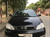 Cần bán Toyota Corolla altis 1.8G đời 2003, màu đen, giá 230tr