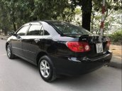 Cần bán Toyota Corolla altis 1.8G đời 2003, màu đen, giá 230tr