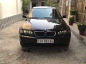 Cần bán BMW 318i sản xuất 2004, màu đen, số tự động