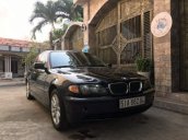 Cần bán BMW 318i sản xuất 2004, màu đen, số tự động