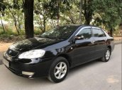 Cần bán Toyota Corolla altis 1.8G đời 2003, màu đen, giá 230tr