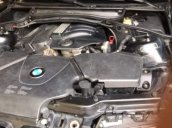 Cần bán BMW 318i sản xuất 2004, màu đen, số tự động