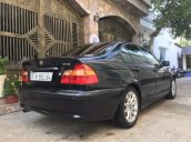 Cần bán BMW 318i sản xuất 2004, màu đen, số tự động