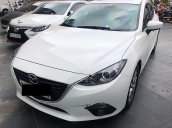 Bán Mazda 3 1.5G đời 2015, màu trắng xe gia đình