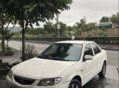 Bán ô tô Mazda 323 năm 2003, màu trắng, máy Nhật bền bỉ